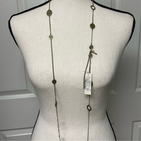 NWT Kenneth Cole long 56 inch gold tone necklace; wear multiple ways. Signed. - Picture 4 of 12